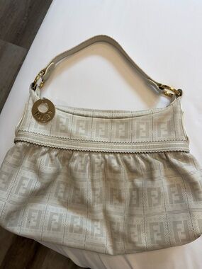 Fendi Pre-Loved Off White Zucca Chef perforated shoulder bag🤍